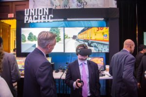 Alan Fisher demonstrates Virtual Reality for RailXTech attendee